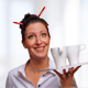 Portrait photo of Anja Missenberger from eggheads with cups | eggheads.net