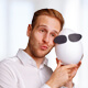 Portrait photo of Dardan Buck from eggheads with styrofoam eggheads mascot | eggheads.net