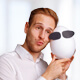 Portrait photo of Dardan Buck from eggheads with styrofoam eggheads mascot | eggheads.net