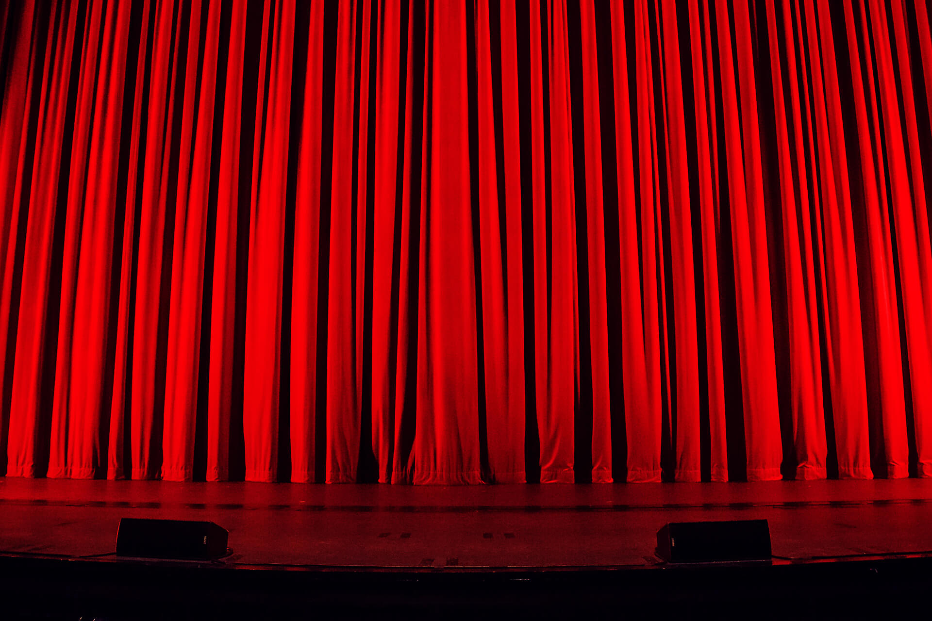 Closed red stage curtain | eggheads.net