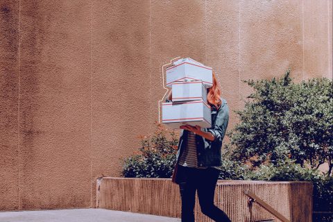 Woman with packages from online store order | eggheads.net